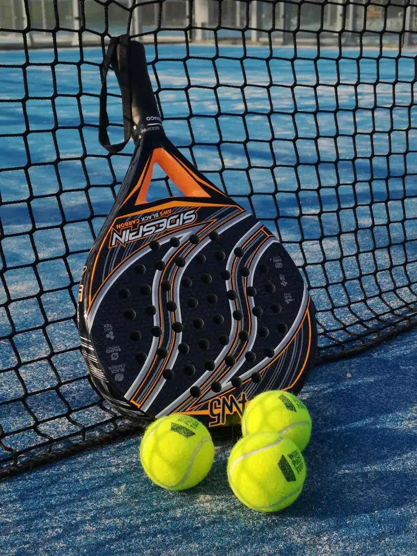 Padel racket and ball detail